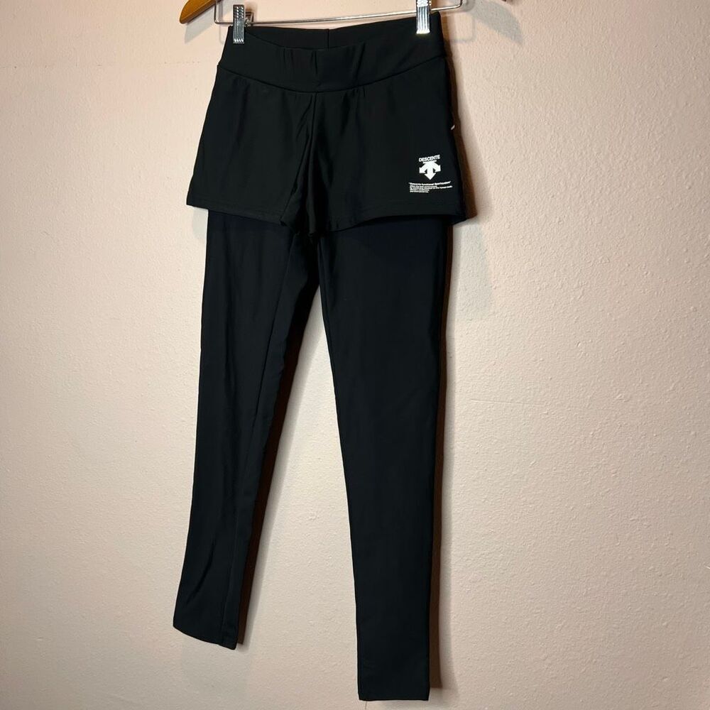 Descente brand black skirted legging, a functional athletic garment that combine